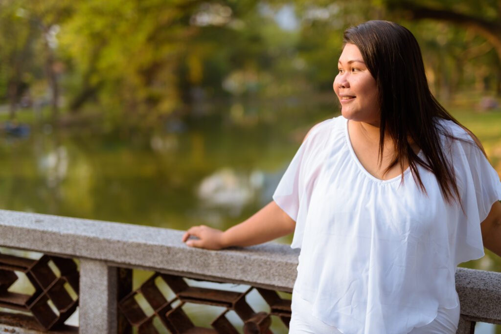 beautiful overweight asian woman relaxing at the p 2025 01 29 04 19 56 utc
