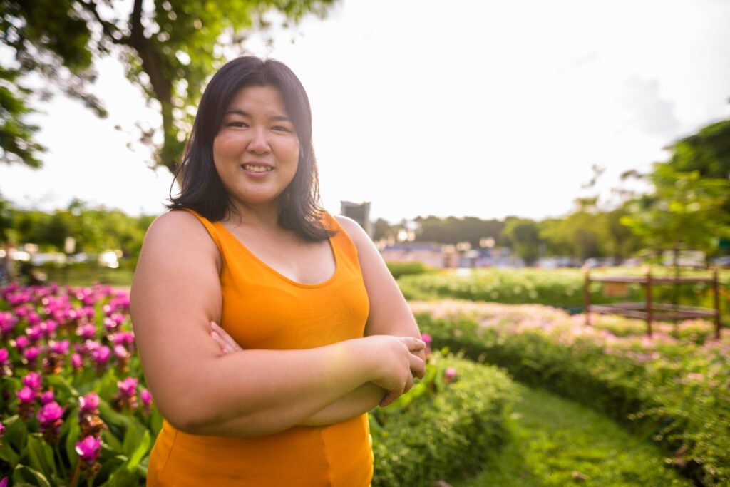 beautiful overweight asian woman with arms crossed 2025 01 29 01 59 10 utc