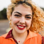 bohemian young girl smiling on camera outdoor fo 2025 02 21 16 10 26 utc