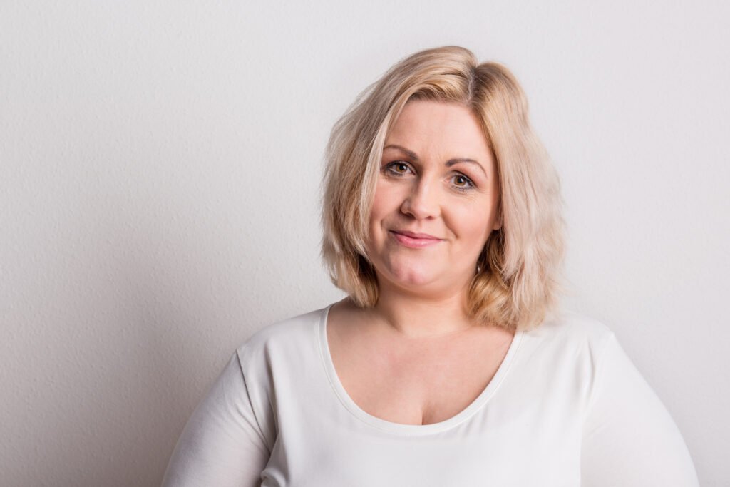 portrait of an attractive overweight woman in stud 2024 10 18 10 03 03 utc