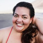 portrait of plus size woman smiling on camera wear 2025 02 21 03 52 53 utc